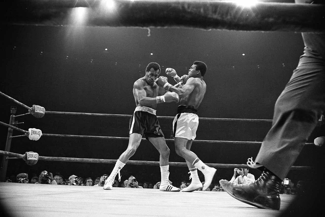 Muhammad Ali and Ken Norton exchange blows during their boxing match in 1973